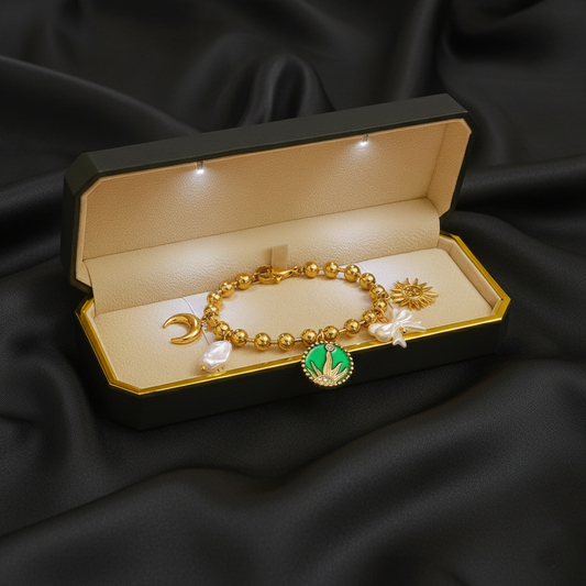 RemindraLux 18K Gold-Plated Sun & Moon Beaded Charm Bracelet with Green Enamel Medallion