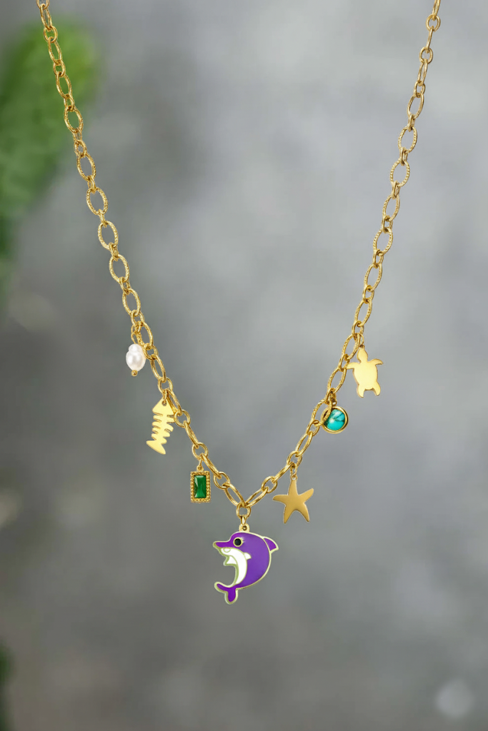 RemindraLux 18K Gold-Plated Ocean Charms Necklace with Dolphin, Starfish & Emerald Accent