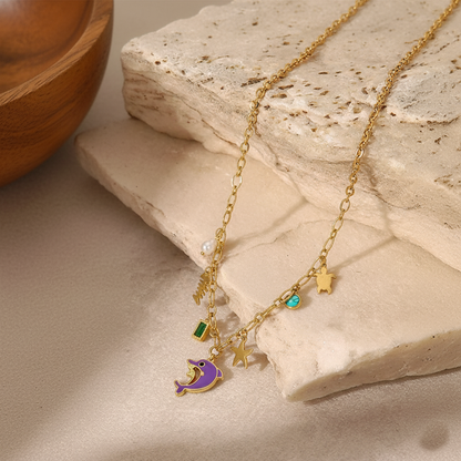 RemindraLux 18K Gold-Plated Ocean Charms Necklace with Dolphin, Starfish & Emerald Accent