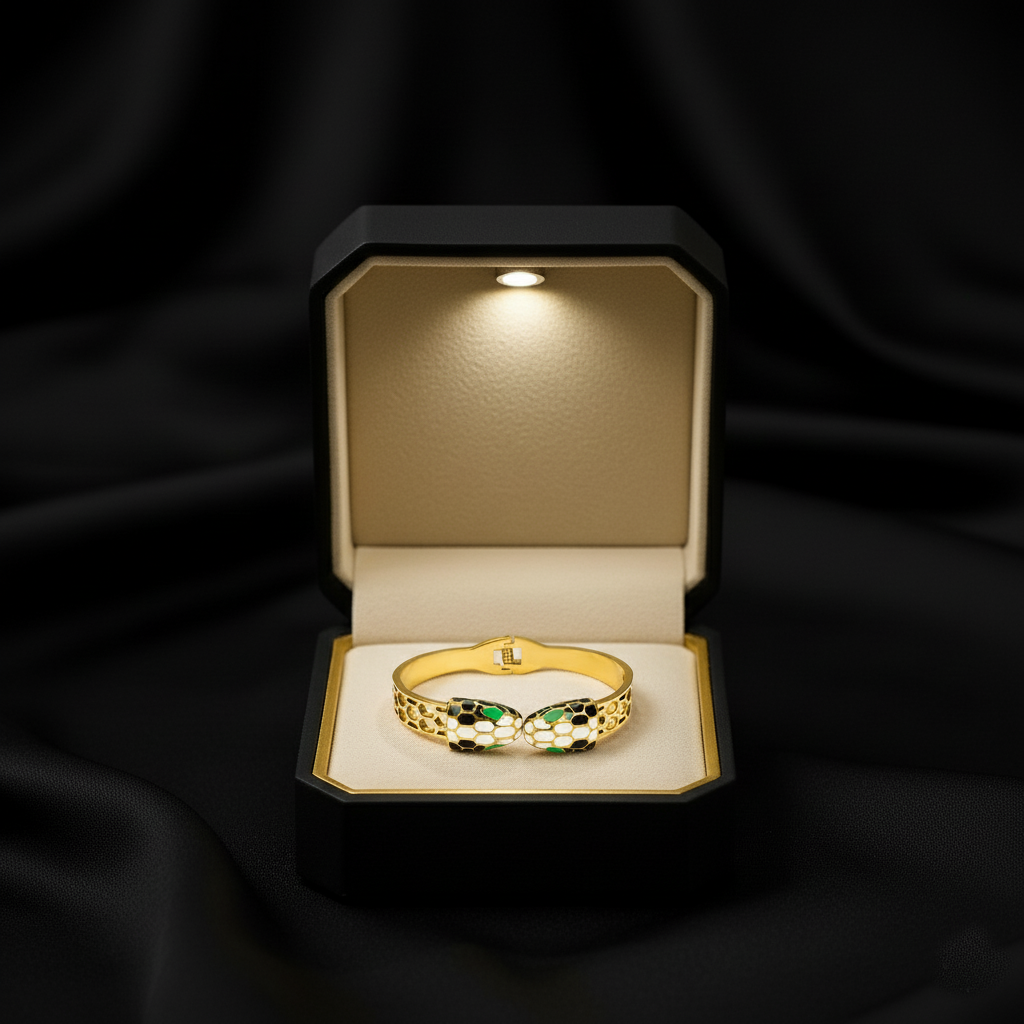 RemindraLux 18K Gold-Plated Serpent Embrace Bangle with Enamel Scales & Emerald Eyes