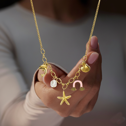 RemindraLux 18K Gold-Plated Ocean Charm Necklace with Dolphin, Starfish, Shell, Pearl & Rainbow