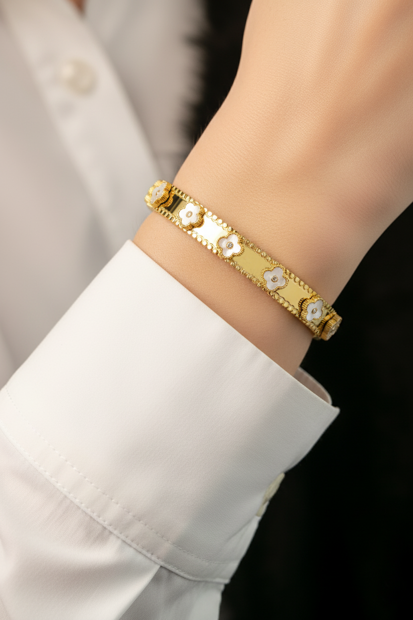 RemindraLux 18K Gold-Plated Beaded Edge Bangle with White Enamel Flowers