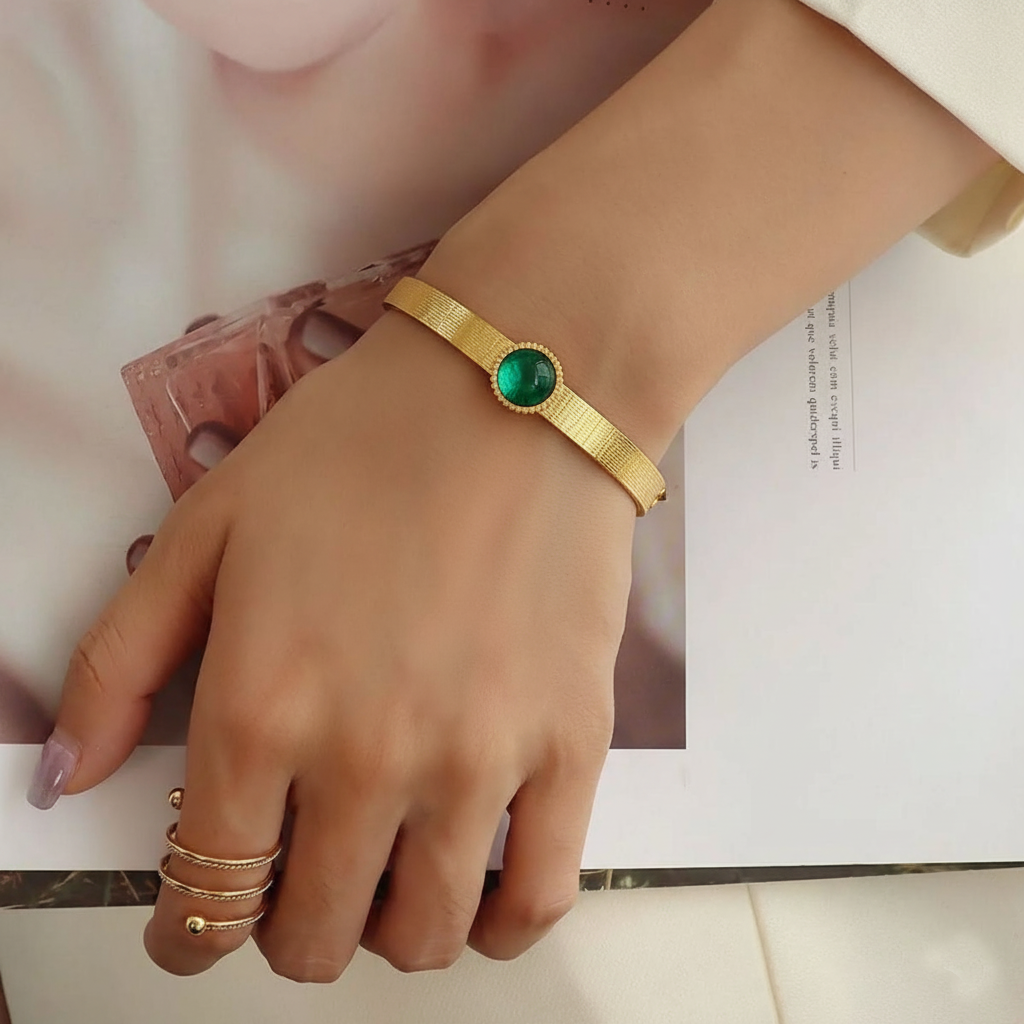 RemindraLux 18K Gold-Plated Textured Bangle with Emerald Green Gemstone