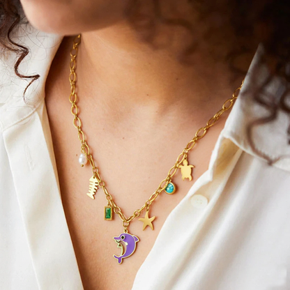 RemindraLux 18K Gold-Plated Ocean Charms Necklace with Dolphin, Starfish & Emerald Accent