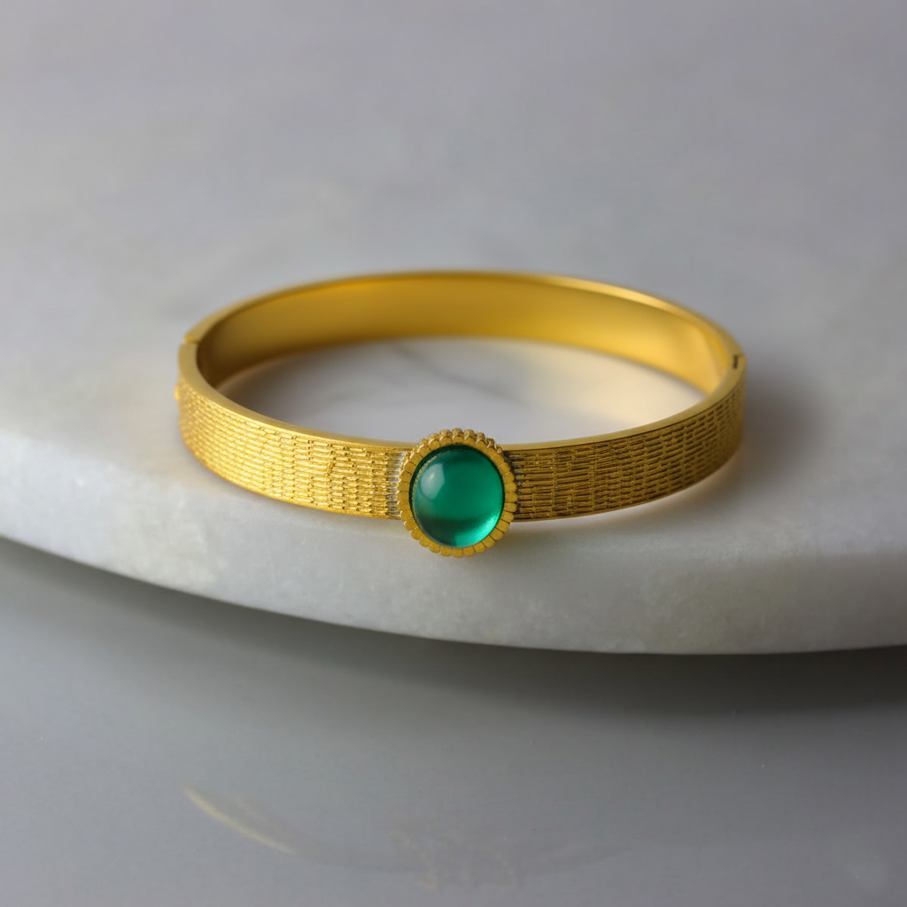 RemindraLux 18K Gold-Plated Textured Bangle with Emerald Green Gemstone