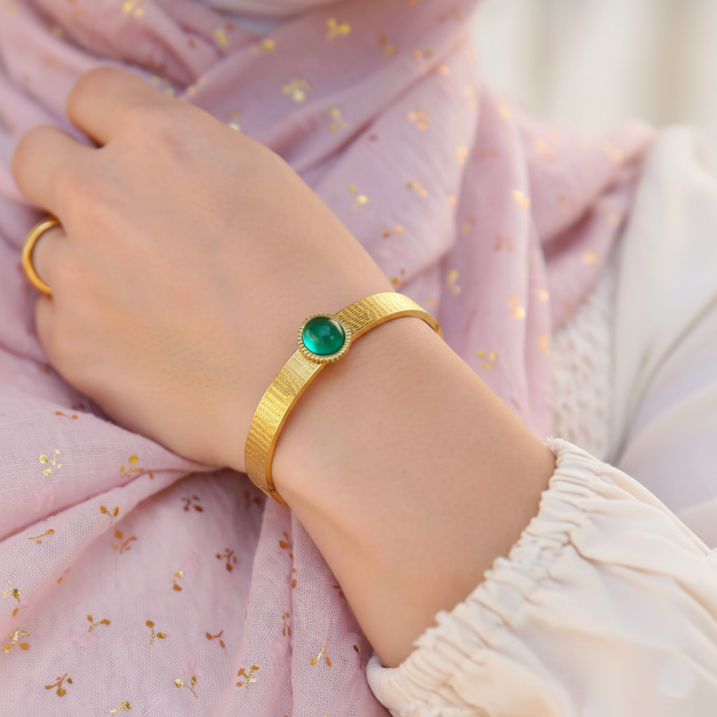 RemindraLux 18K Gold-Plated Textured Bangle with Emerald Green Gemstone