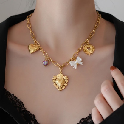 RemindraLux 18K Gold-Plated Sacred Heart Medallion Necklace with Sun, Bow & Glass Heart