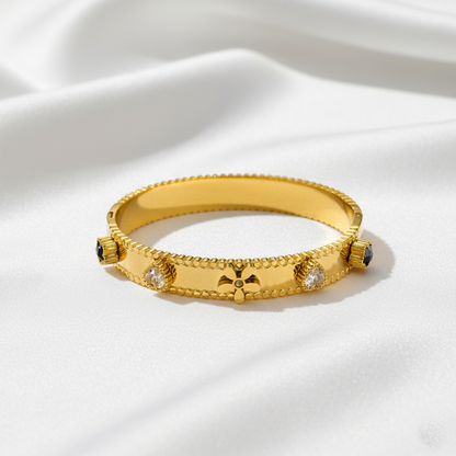 RemindraLux 18K Gold-Plated Beaded Edge Bangle with Flower, Heart & Black Star