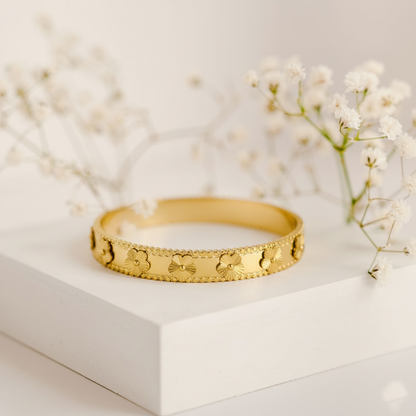 RemindraLux 18K Gold-Plated Beaded Edge Bangle with Golden Flowers