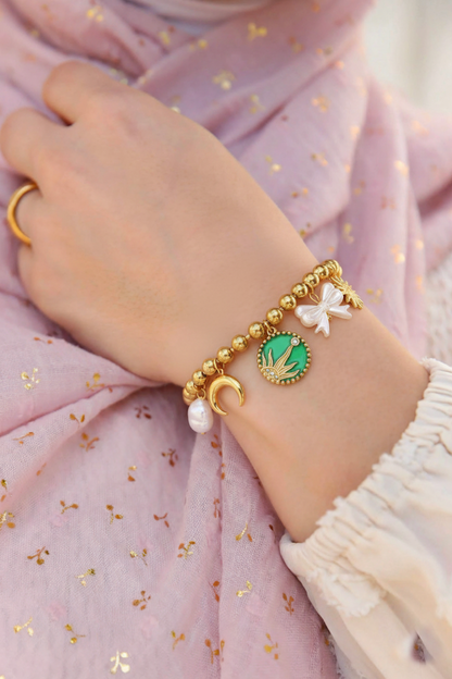 RemindraLux 18K Gold-Plated Sun & Moon Beaded Charm Bracelet with Green Enamel Medallion