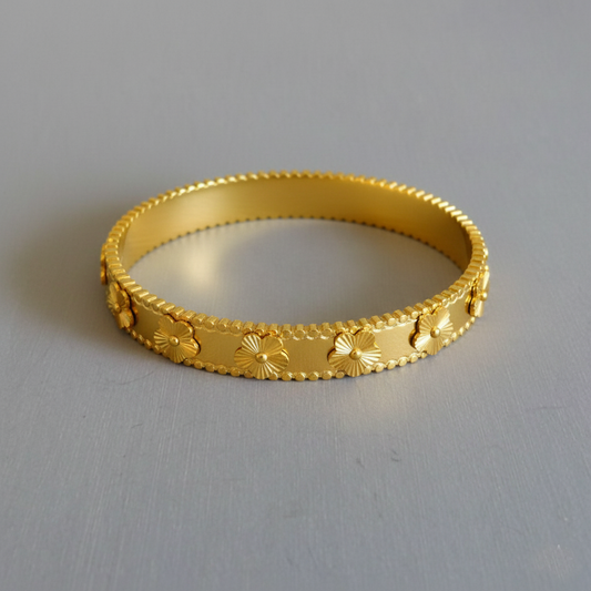 RemindraLux 18K Gold-Plated Beaded Edge Bangle with Golden Flowers