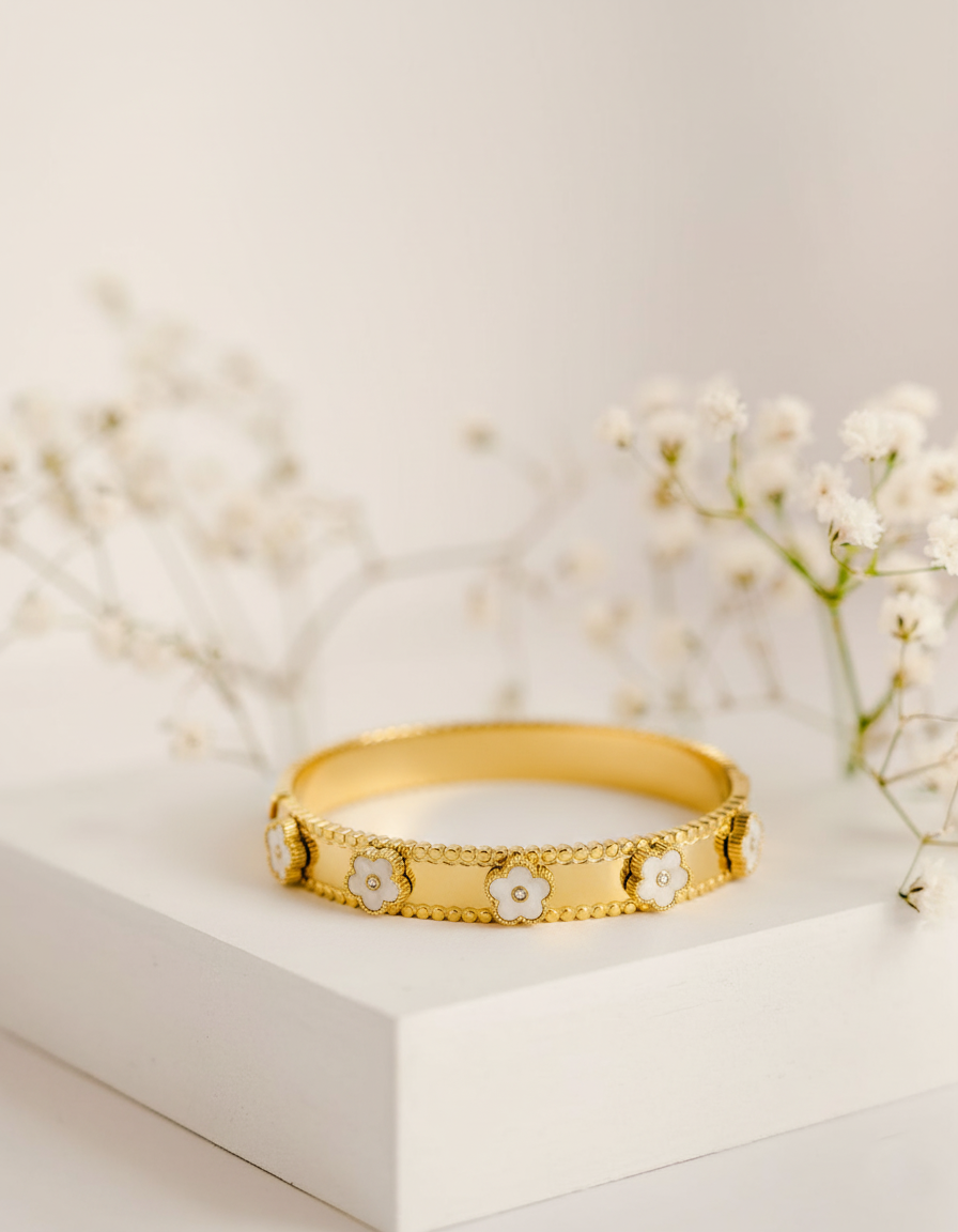 RemindraLux 18K Gold-Plated Beaded Edge Bangle with White Enamel Flowers