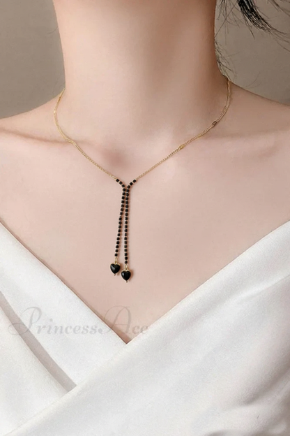 RemindraLux 18K Gold-Plated Black Bead Twin Heart Necklace
