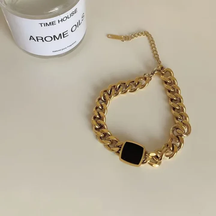 RemindraLux 18K Gold-Plated Chain Bracelet with Black Onyx Centerpiece