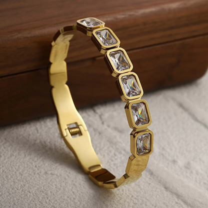 RemindraLux 18K Gold-Plated Emerald-Cut Crystal Bezel Bangle