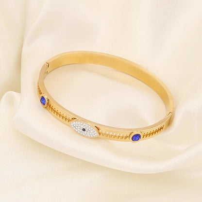 RemindraLux 18K Gold-Plated Evil Eye Bangle with Blue Crystals
